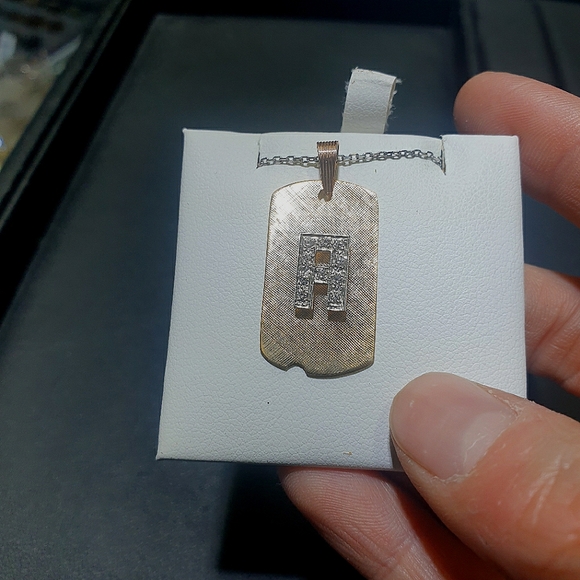 14k gold dog tag with name initial
